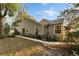 House exterior showcasing backyard and landscaping at 9402 Forest Hills Cir, Tampa, FL 33612