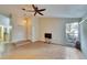 Living room with tile floors and a high ceiling at 9402 Forest Hills Cir, Tampa, FL 33612