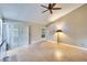 Living room with tile floors and sliding glass doors at 9402 Forest Hills Cir, Tampa, FL 33612
