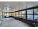 Extended screened porch with view of backyard at 9402 Forest Hills Cir, Tampa, FL 33612