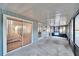 Spacious screened porch with view of backyard at 9402 Forest Hills Cir, Tampa, FL 33612