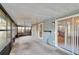 Large screened porch with access to backyard at 9402 Forest Hills Cir, Tampa, FL 33612