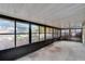 Spacious screened porch overlooking backyard at 9402 Forest Hills Cir, Tampa, FL 33612