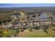 Residential home nestled in a community by a golf course and lake at 12818 Royal George Ave, Odessa, FL 33556