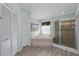 Bathroom with a large soaking tub and walk-in shower at 12818 Royal George Ave, Odessa, FL 33556