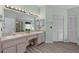 Double vanity bathroom with light-colored cabinets at 12818 Royal George Ave, Odessa, FL 33556