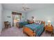 Charming bedroom with twin beds and wood flooring at 12818 Royal George Ave, Odessa, FL 33556
