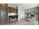 Breakfast nook with wood table, chairs, and view to backyard at 12818 Royal George Ave, Odessa, FL 33556