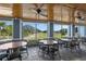 Clubhouse dining area with tables and golf course view at 12818 Royal George Ave, Odessa, FL 33556