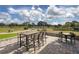 Outdoor patio furniture with golf course view at 12818 Royal George Ave, Odessa, FL 33556