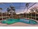 Beautiful screened pool with waterfall feature at 12818 Royal George Ave, Odessa, FL 33556
