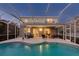 Relaxing screened pool and patio, perfect for outdoor living at 12818 Royal George Ave, Odessa, FL 33556