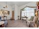 Relaxing sitting area with a large window and comfortable seating at 12818 Royal George Ave, Odessa, FL 33556