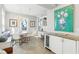 Cozy breakfast nook with bench seating, a chandelier, and a built-in bar area at 2001 Beach Se Dr, St Petersburg, FL 33705