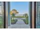 Grand entry door welcomes you to water views, with beautiful landscaping at 2001 Beach Se Dr, St Petersburg, FL 33705