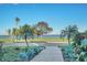 Beautifully landscaped walkway leading up to a house with a view of the bay at 2001 Beach Se Dr, St Petersburg, FL 33705