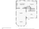 First floor plan of the home including the kitchen, bathroom, dining and living rooms, and foyer at 2001 Beach Se Dr, St Petersburg, FL 33705