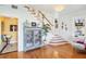 Inviting foyer with hardwood floors, staircase and decorative furnishings at 2001 Beach Se Dr, St Petersburg, FL 33705