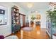 Spacious foyer with hardwood floors and view into the dining and living areas at 2001 Beach Se Dr, St Petersburg, FL 33705