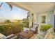 Inviting porch seating area, perfect for enjoying sunrises over the water at 2001 Beach Se Dr, St Petersburg, FL 33705