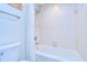 Simple bathroom with a shower/tub combo and white tile at 5357 Cobblestone Ct, Wesley Chapel, FL 33543