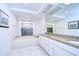Bathroom with a bathtub, double vanity, and granite countertop at 5357 Cobblestone Ct, Wesley Chapel, FL 33543