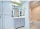 Clean bathroom with a vanity, shower, and bathtub at 5357 Cobblestone Ct, Wesley Chapel, FL 33543