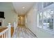 Bright entryway with tile flooring and double doors, leading to the main living area at 5357 Cobblestone Ct, Wesley Chapel, FL 33543