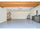 Spacious garage with epoxy floor and storage at 5357 Cobblestone Ct, Wesley Chapel, FL 33543