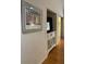 Living room with built-in media console and hardwood floors at 5357 Cobblestone Ct, Wesley Chapel, FL 33543