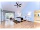 Large main bedroom with high ceilings, king bed, and access to private patio at 5357 Cobblestone Ct, Wesley Chapel, FL 33543