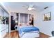 Bedroom with floral wall art and a ceiling fan at 807 Belle Timbre Ave, Brandon, FL 33511