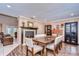 Spacious dining area with hardwood floors, a fireplace, and built-in cabinetry at 807 Belle Timbre Ave, Brandon, FL 33511