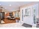 Formal dining room with hardwood floors, a wooden table, and a stained-glass door at 807 Belle Timbre Ave, Brandon, FL 33511