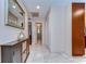 Bright hallway with tile flooring and storage cabinet at 807 Belle Timbre Ave, Brandon, FL 33511