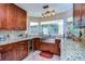 Kitchen features granite countertops, a farmhouse sink, and a wine cooler at 807 Belle Timbre Ave, Brandon, FL 33511