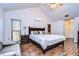Large main bedroom with hardwood floors and access to private patio at 807 Belle Timbre Ave, Brandon, FL 33511