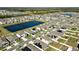Large community with lake and many houses at 16743 Carlton Pond St, Wimauma, FL 33598