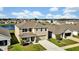 Two-story house with a lake view in a new Florida community at 16743 Carlton Pond St, Wimauma, FL 33598