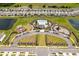 Aerial view of community pool, playground, and parking at 16743 Carlton Pond St, Wimauma, FL 33598