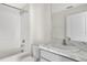 Clean bathroom with marble vanity and shower/tub combo at 16743 Carlton Pond St, Wimauma, FL 33598