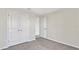 Bedroom with double door closet and additional door at 16743 Carlton Pond St, Wimauma, FL 33598