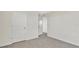 Spacious bedroom with neutral walls and carpet at 16743 Carlton Pond St, Wimauma, FL 33598
