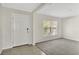 Bright entryway with tile flooring and neutral walls at 16743 Carlton Pond St, Wimauma, FL 33598