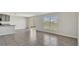 Open living area with tile flooring and access to backyard at 16743 Carlton Pond St, Wimauma, FL 33598
