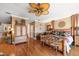 Large main bedroom with hardwood floors and a ceiling fan at 354 Larboard Way, Clearwater Beach, FL 33767