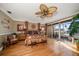 Spacious main bedroom with hardwood floors and access to a balcony at 354 Larboard Way, Clearwater Beach, FL 33767