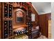 Well-stocked wine cellar with extensive built-in racking at 354 Larboard Way, Clearwater Beach, FL 33767