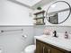 Modern bathroom with floating vanity and decorative accents at 4405 Vieux Carre Cir # 46, Tampa, FL 33613