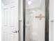 Small bathroom with shower and glass enclosure at 4405 Vieux Carre Cir # 46, Tampa, FL 33613